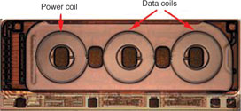 Figure 3. Photograph of transformer die showing the power transformer coil and the two data transformer coils